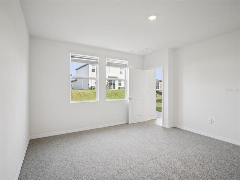 Spacious, unfurnished interior of a new home in Leyland Preserve - Premier Series, Brooksville (Image 14).