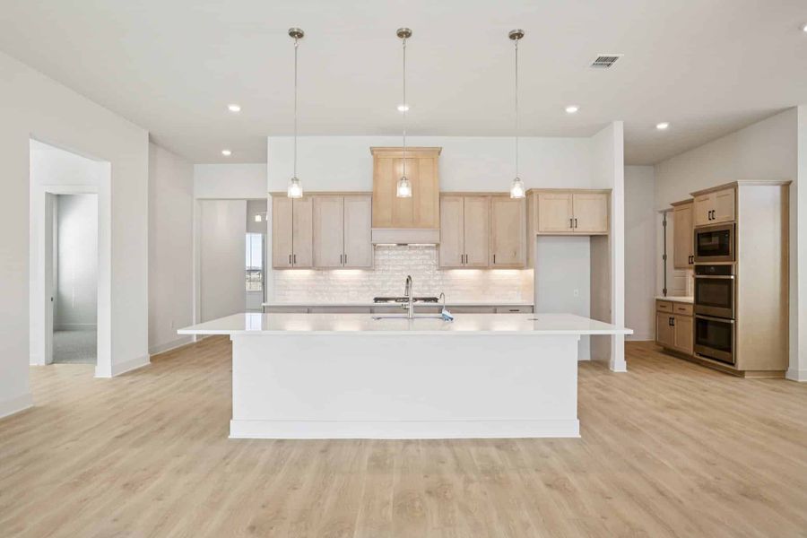 Furnished interior view inside a new home in Sunfield, Buda (Image 9).