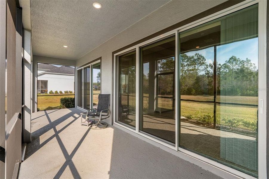Exterior details and patio area of a home in , Ormond Beach (Image 19).