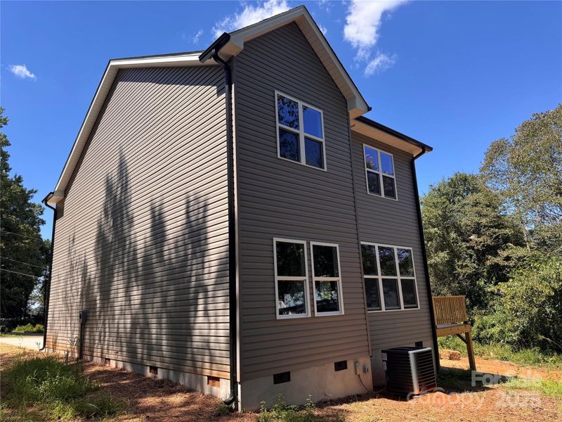 Front exterior of a new home in , Hickory, NC, highlighting curb appeal (Image 2).