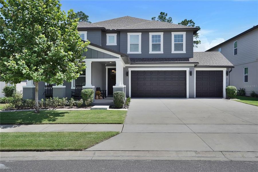 Front exterior of a new home in , Minneola, FL, highlighting curb appeal (Image 23). Front exterior of a new home in , Minneola, FL, highlighting curb appeal (Image 23).