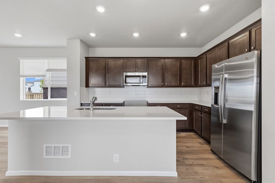 Furnished interior view inside a new home in Windler, Aurora (Image 3).