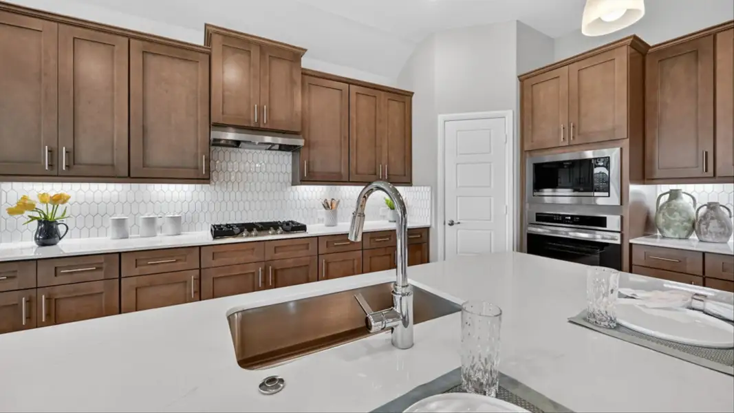 Furnished interior view inside a new home in Lakeview Pointe, Grand Prairie (Image 13).