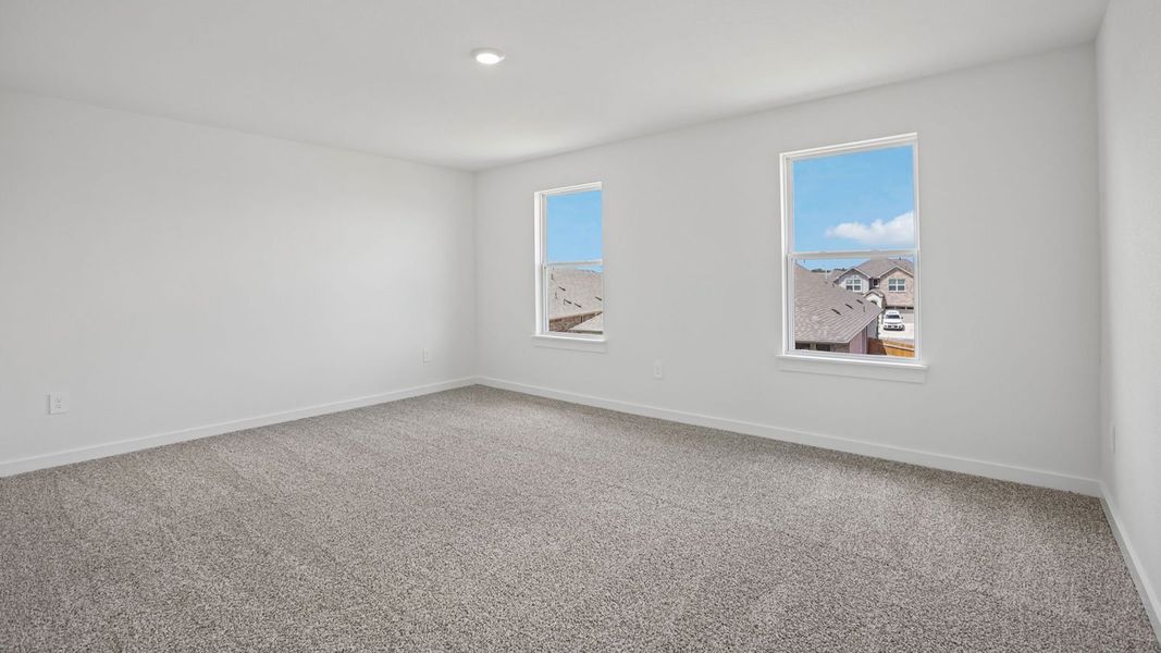 Spacious, unfurnished interior of a new home in Rosenbusch Ranch, Leander (Image 46).