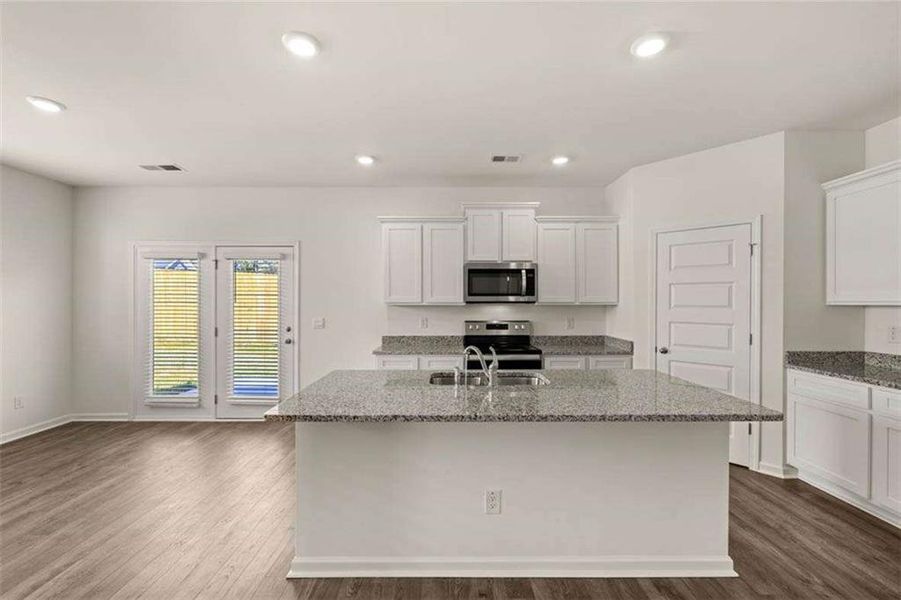 Furnished interior view inside a new home in Oakchase at Hampton, Hampton (Image 10).