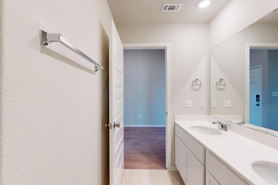Furnished interior view inside a new home in Carillon, Manor (Image 9).
