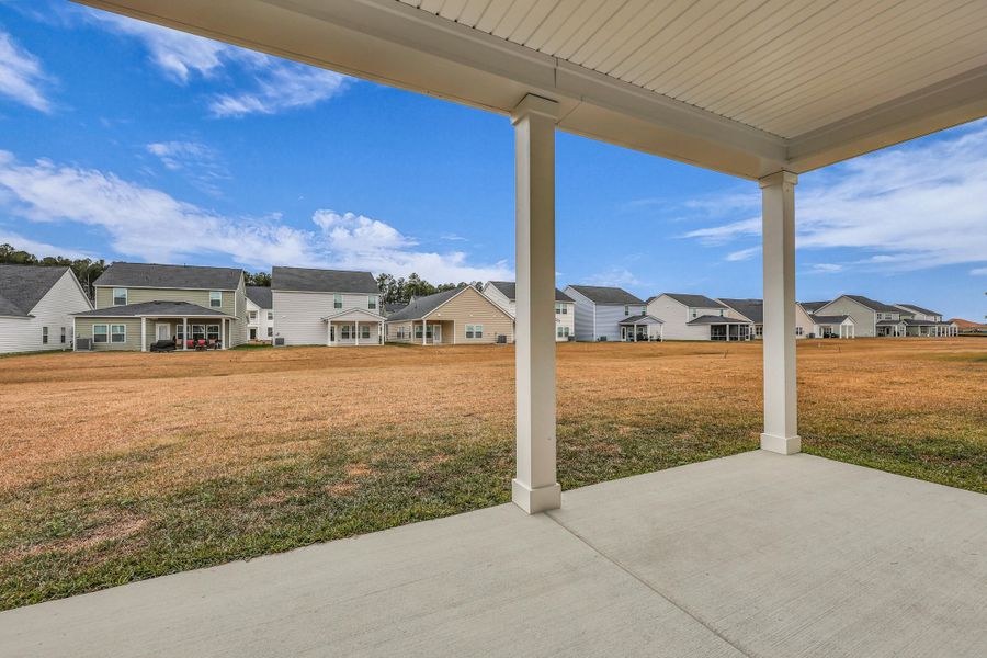 Exterior details and patio area of a home in Sweetgrass at Summers Corner: Carolina Collection, Summerville (Image 3).