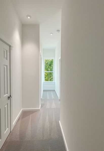 Third floor hallway with Extra Large windows for lots of natural light.