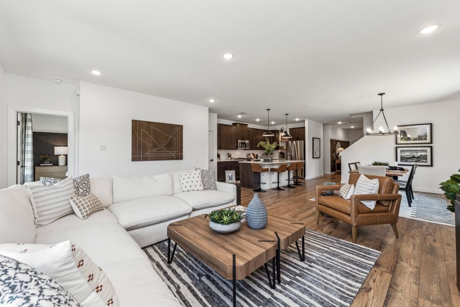 Great room adjacent to kitchen and dining area