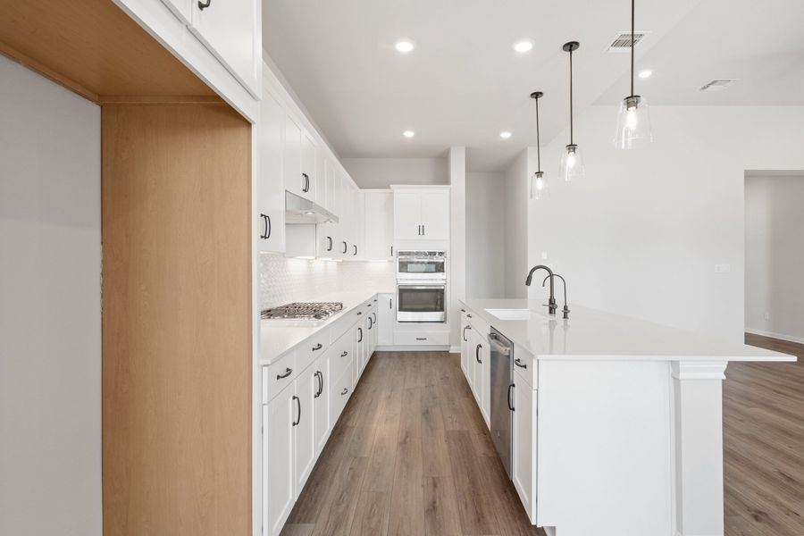 Representative furnished interior of a home built from the Sawgrass by Ashton Woods in Berry Creek Highlands, Georgetown (Image 11). Representative furnished interior of a home built from the Sawgrass by Ashton Woods in Berry Creek Highlands, Georgetown (Image 11).