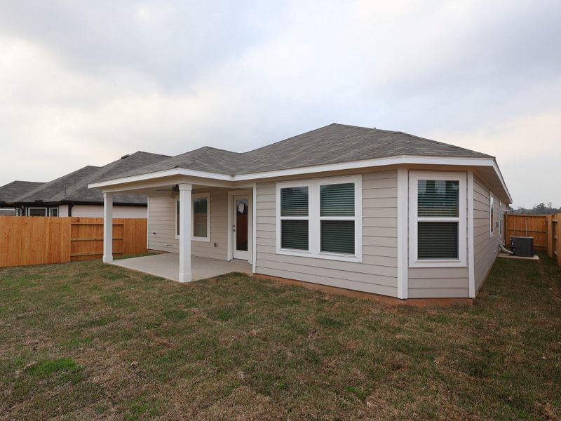 Exterior details and patio area of a home in Lone Star Landing, Montgomery (Image 21). Exterior details and patio area of a home in Lone Star Landing, Montgomery (Image 21).