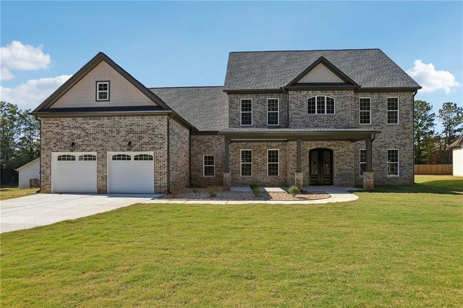 Front exterior of a new home in , Lilburn, GA, highlighting curb appeal (Image 2). Front exterior of a new home in , Lilburn, GA, highlighting curb appeal (Image 2).