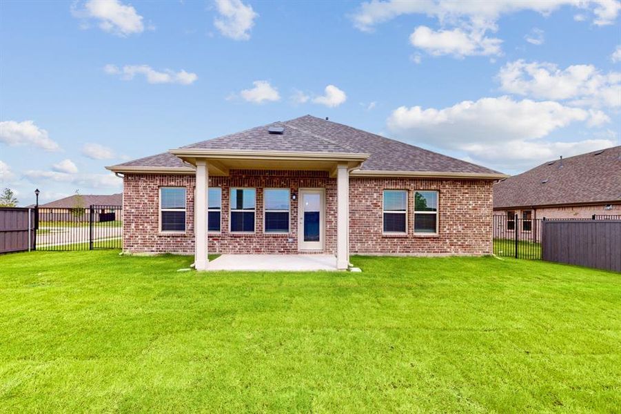 Exterior details and patio area of a home in Prairie Ridge at Goodland, Venus (Image 22).