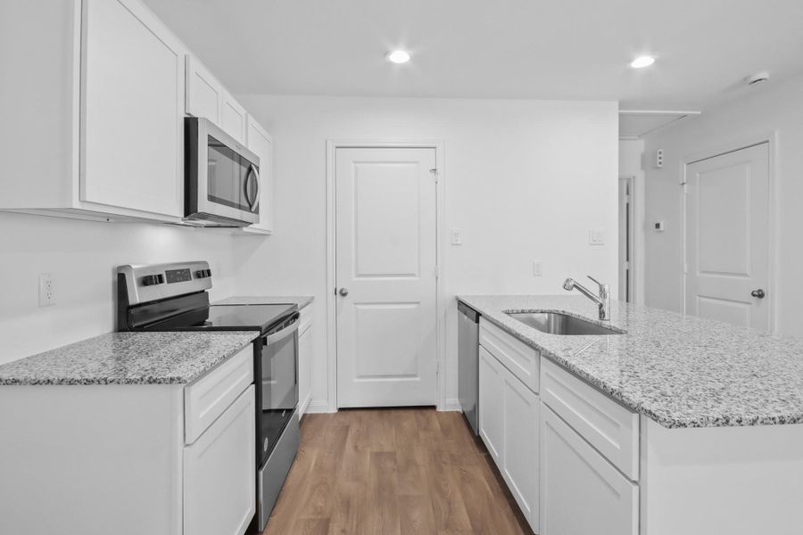 Furnished interior view inside a new home in William Trails, Willis (Image 2). Furnished interior view inside a new home in William Trails, Willis (Image 2).