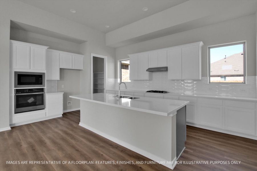 Furnished interior view inside a new home in Sunterra 50s, Katy (Image 4).