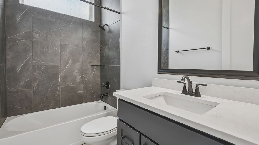 Furnished interior view inside a new home in Artavia, Conroe (Image 13).