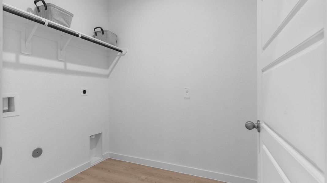 Representative unfurnished interior of a home built from the Mitchell by D.R. Horton in Watermark, Alvin (Image 22).