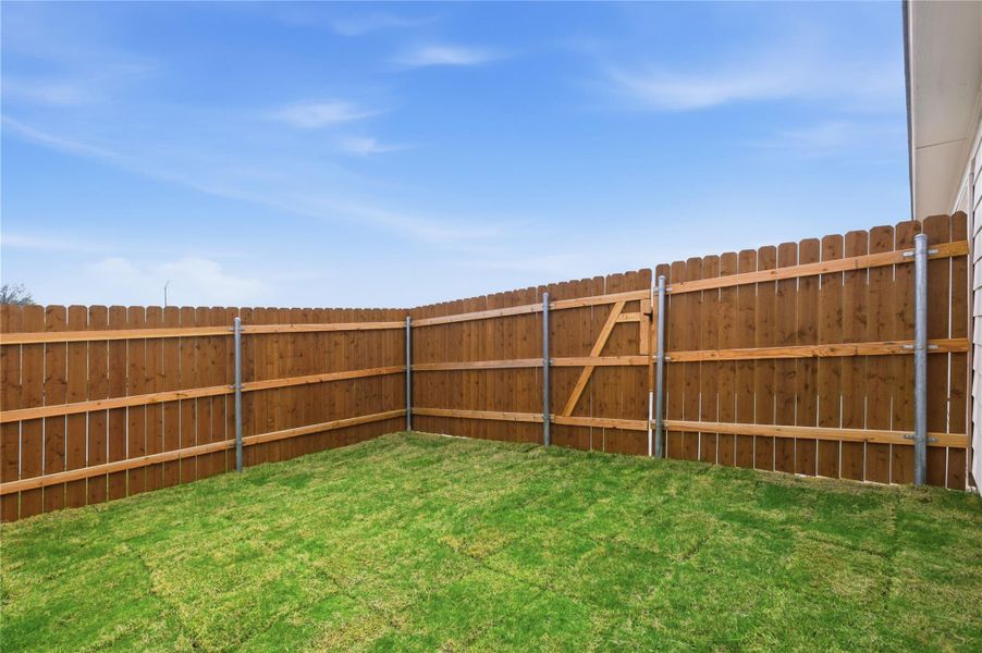 Exterior details and patio area of a home in Infinity Square, Kyle (Image 4). Exterior details and patio area of a home in Infinity Square, Kyle (Image 4).