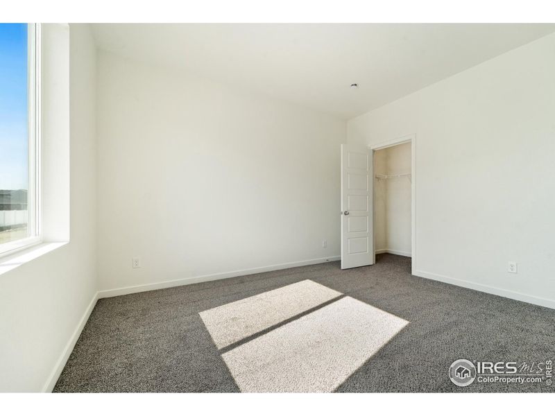 Spacious, unfurnished interior of a new home in Liberty Draw, Evans (Image 10).