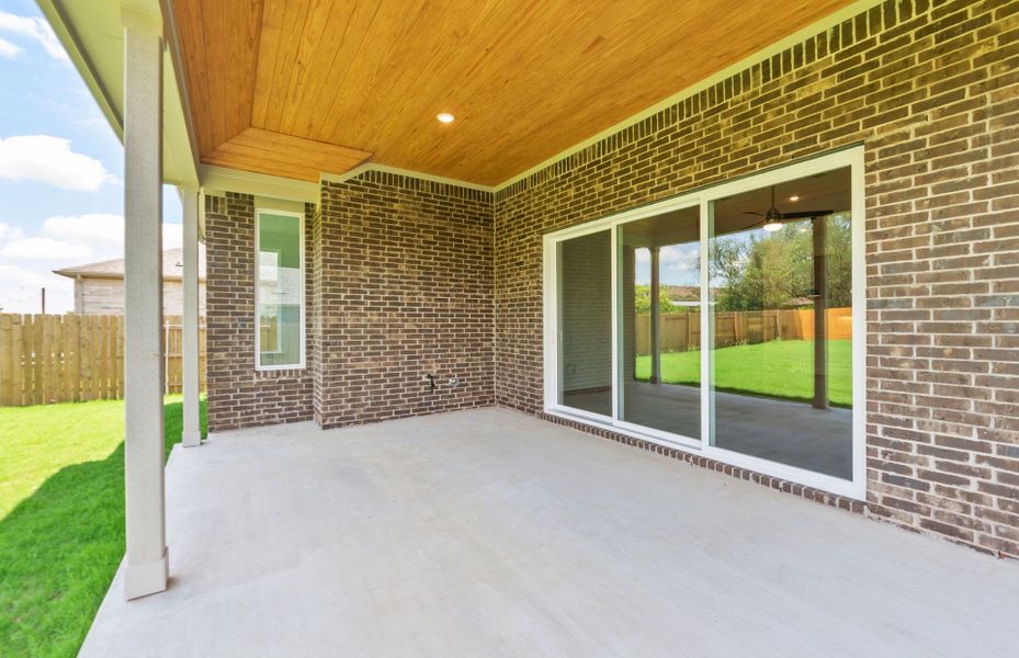 Exterior details and patio area of a home in 6 Creeks, Kyle (Image 26).