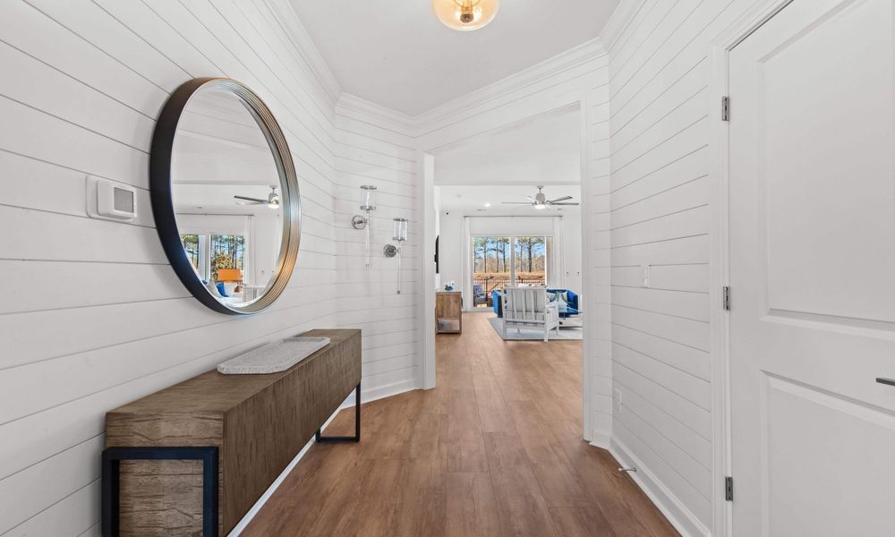 Representative furnished interior of a home built from the The Longboard by Chesapeake Homes in Bridgewater - Shorehaven Village, Little River (Image 41).