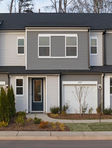 Front exterior of a new home in Fifteen 15 Cannon, Charlotte, NC, highlighting curb appeal (Image 1).