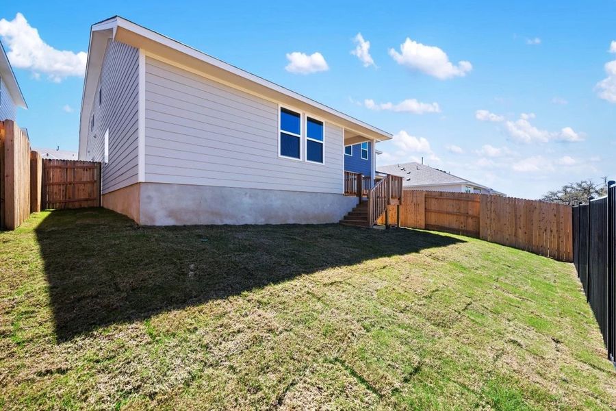 Exterior details and patio area of a home in Cannon Ranch, Dripping Springs (Image 7).