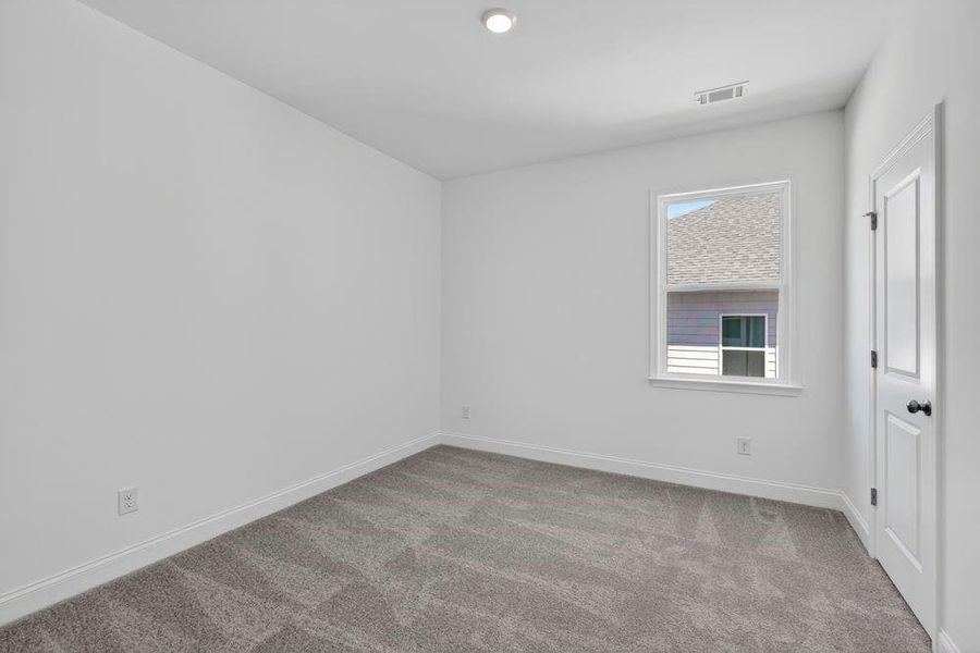 Spacious, unfurnished interior of a new home in Bailey Fence, Dacula (Image 41).