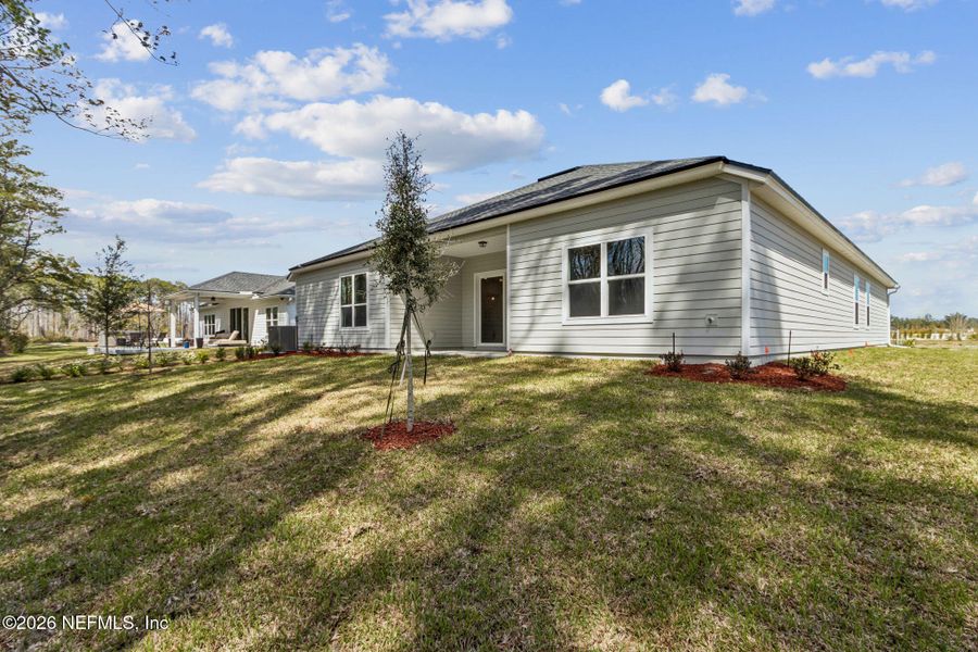 Exterior details and patio area of a home in Sandy Ridge, Yulee (Image 20).