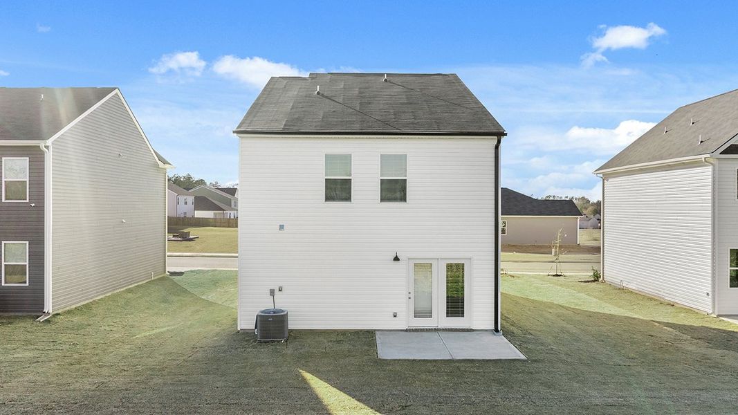 Exterior details and patio area of a home in The Islands, Beech Island (Image 3).