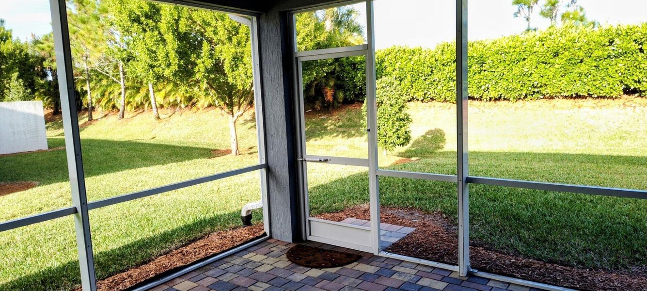 Exterior details and patio area of a home in Del Webb Tradition, Port St. Lucie (Image 23).