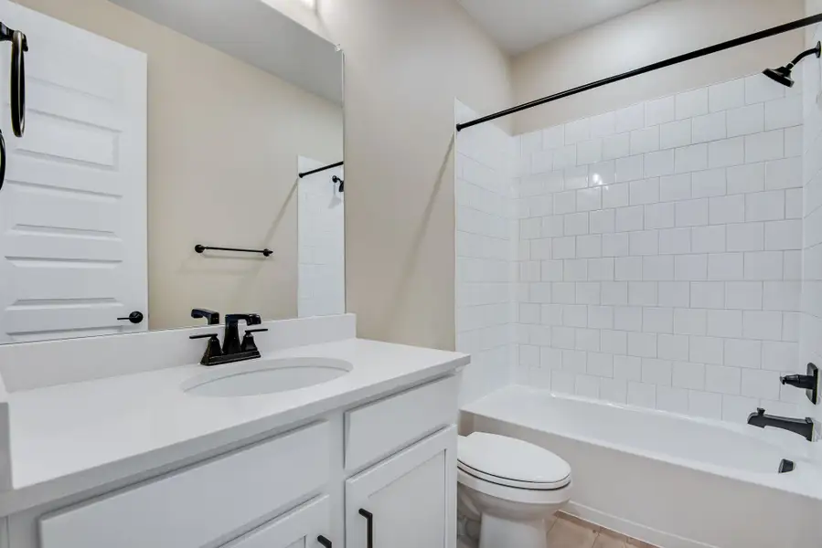 Furnished interior view inside a new home in Reunion, Commerce City (Image 11).
