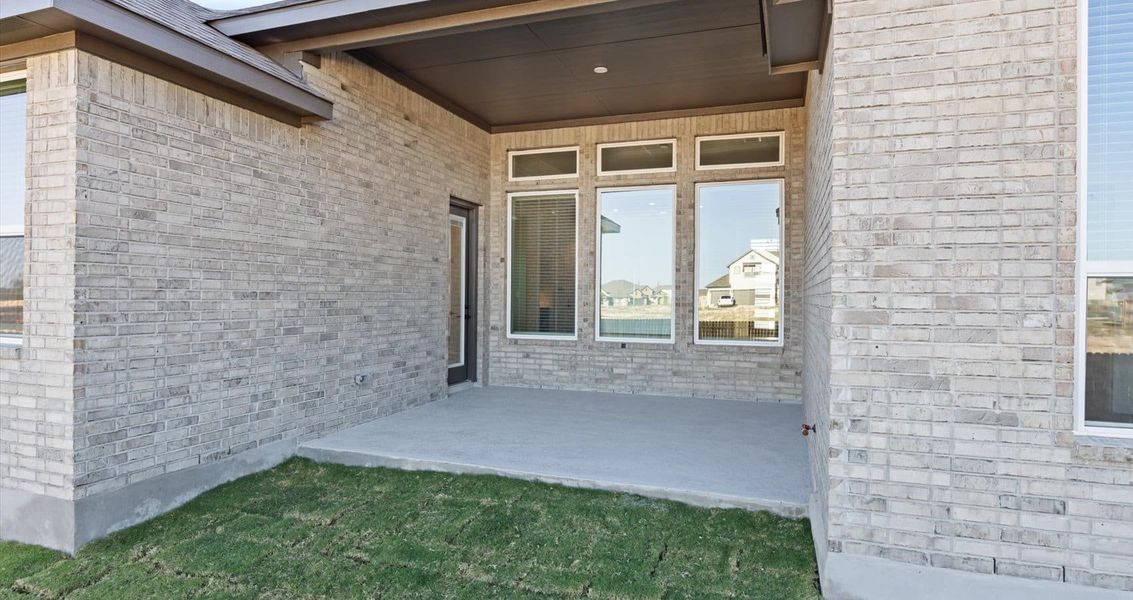 Exterior details and patio area of a home in Village at Three Oaks, Seguin (Image 3). Exterior details and patio area of a home in Village at Three Oaks, Seguin (Image 3).