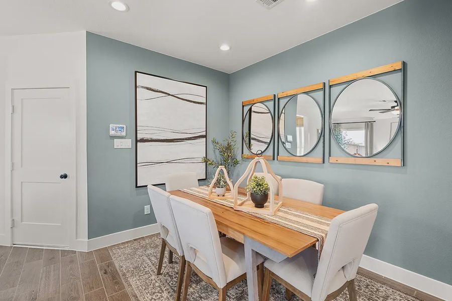 Representative furnished interior of a home built from the Countryside by Chesmar Homes in Meridiana Townhomes, Iowa Colony (Image 10).
