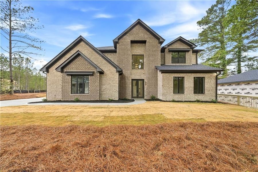 Front exterior of a new home in , Fairburn, GA, highlighting curb appeal (Image 1). Front exterior of a new home in , Fairburn, GA, highlighting curb appeal (Image 1).