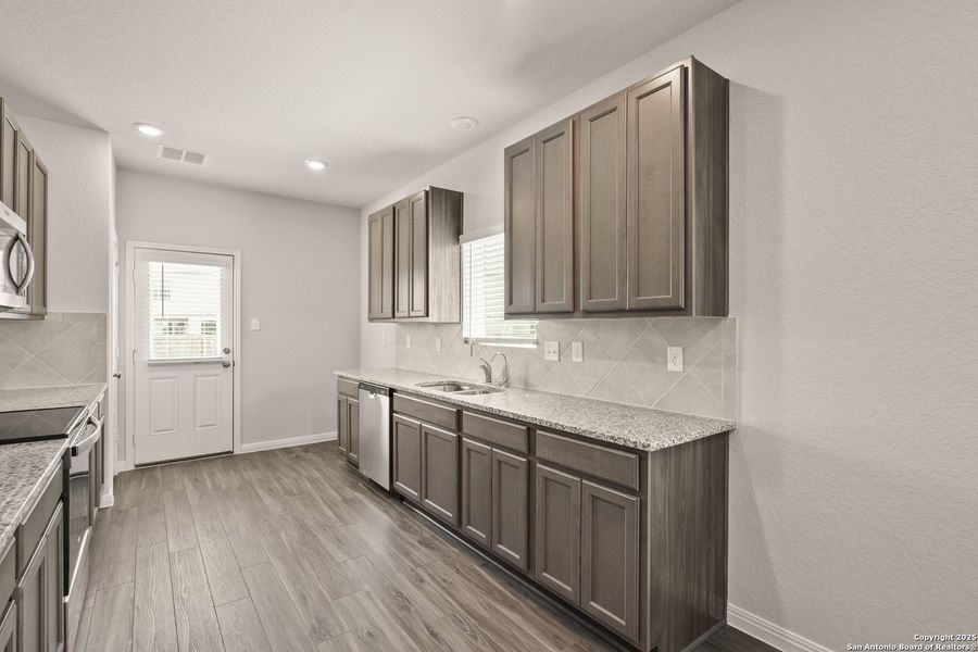 Furnished interior view inside a new home in Melissa Ranch, San Antonio (Image 7). Furnished interior view inside a new home in Melissa Ranch, San Antonio (Image 7).