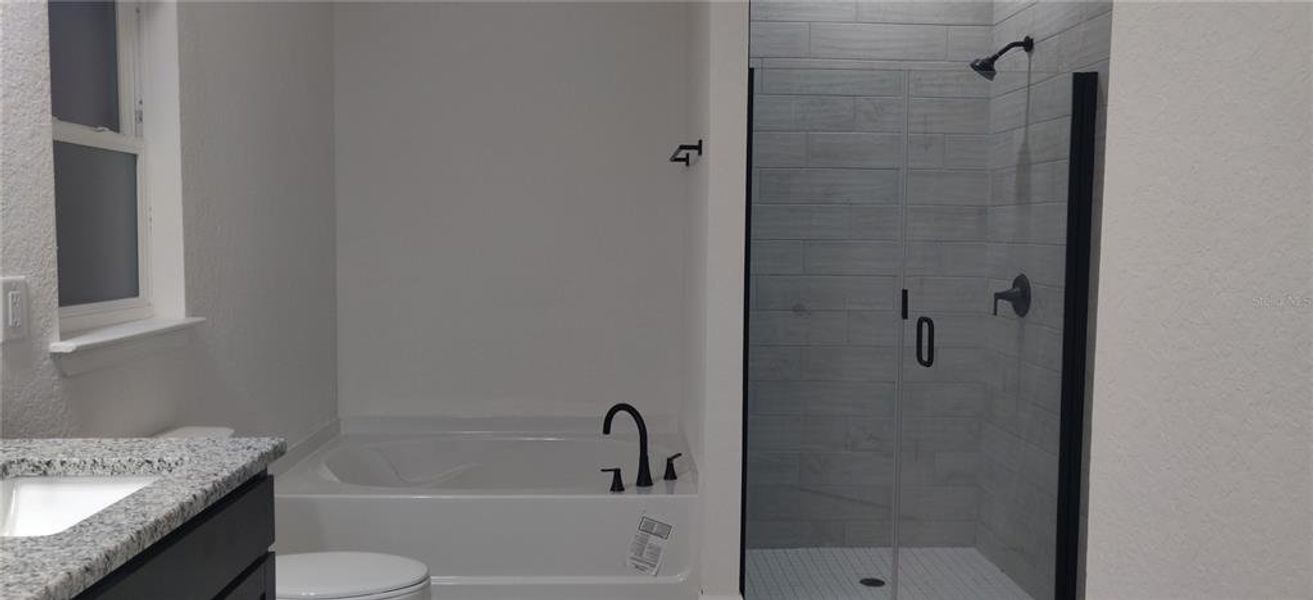 Furnished interior view inside a new home in Sunset Landing, Spring Hill (Image 3).