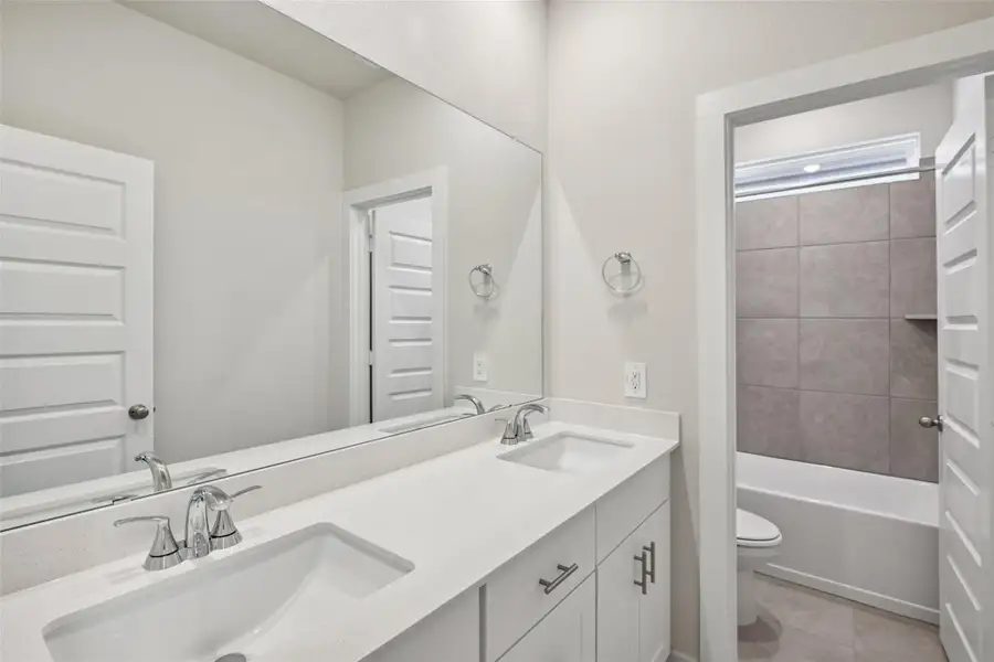 Furnished interior view inside a new home in Parkway Commons - City Series, Missouri City (Image 9).