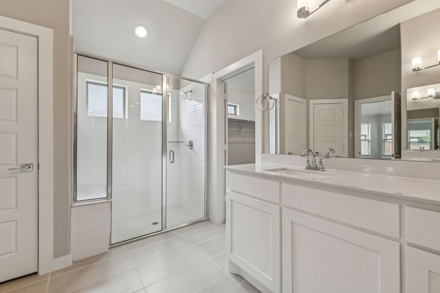 Primary Bathroom in the Daltrey home plan by Trophy Signature Homes – REPRESENTATIVE PHOTO