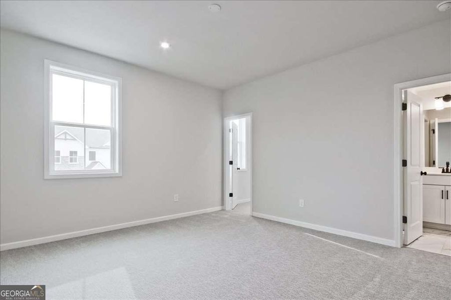 Spacious, unfurnished interior of a new home in The Paddocks at Doc Hughes, Buford (Image 51).