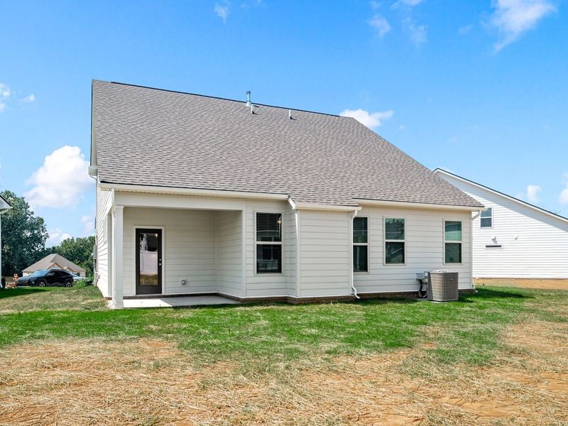 Exterior details and patio area of a home in Woods Crossing, Gallatin (Image 4).