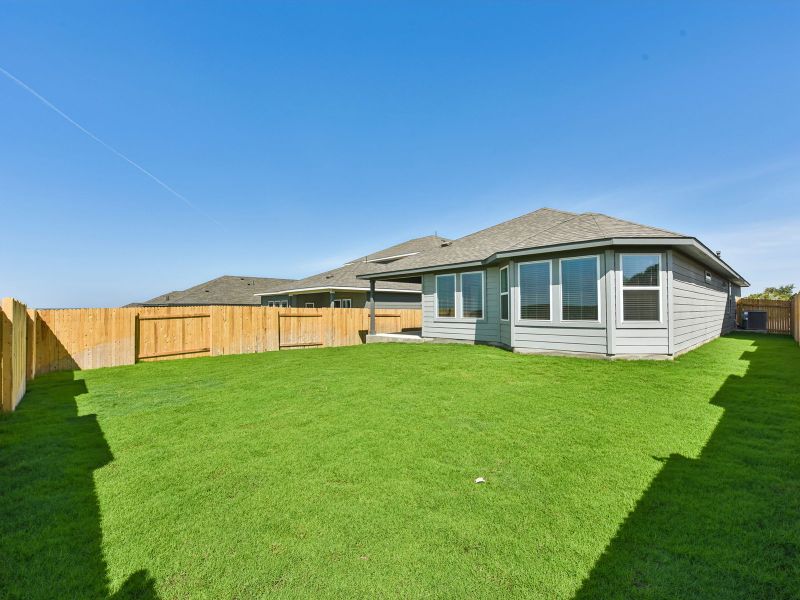 Exterior details and patio area of a home in Butler Farms - Reserve Collection, Liberty Hill (Image 3).