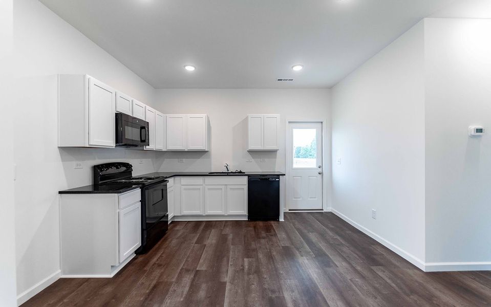 Furnished interior view inside a new home in Stonehenge, Manchester (Image 3).