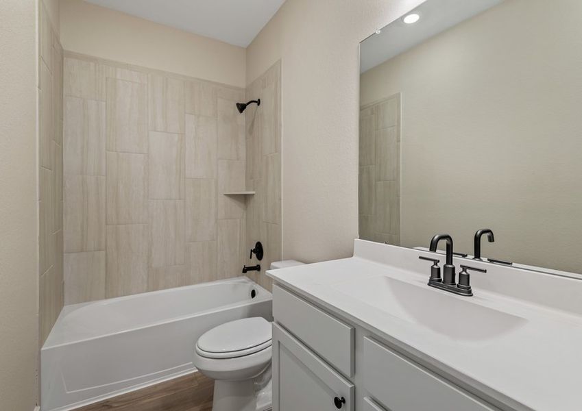 Bathroom with a shower/tub combination