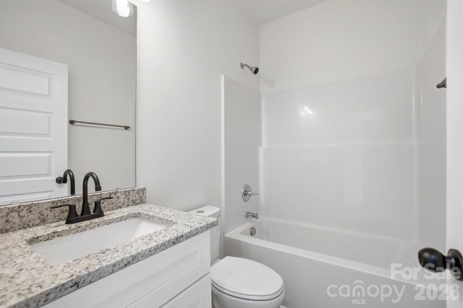 Furnished interior view inside a new home in , Wadesboro (Image 9).