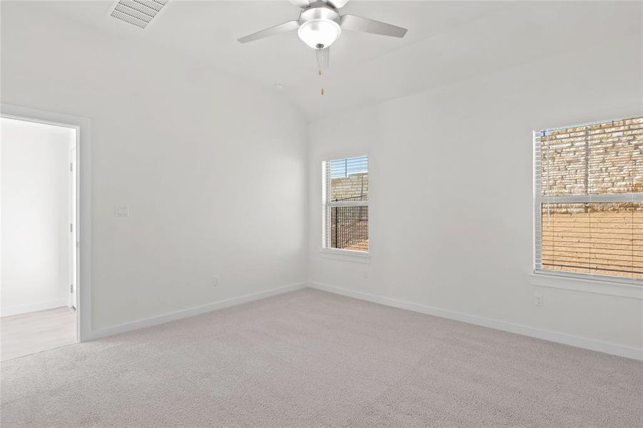 Primary Bedroom in the Pecan II home plan by Trophy Signature Homes – REPRESENTATIVE PHOTO Primary Bedroom in the Pecan II home plan by Trophy Signature Homes – REPRESENTATIVE PHOTO