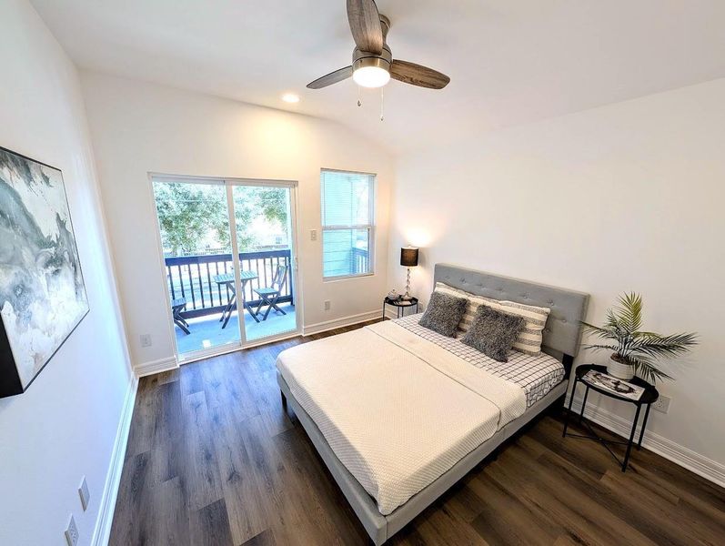 At 11' x 12' (approx.), this bright room features a walk-in closet and secondary balcony access.