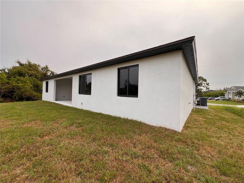 Exterior details and patio area of a home in , Port Charlotte (Image 4). Exterior details and patio area of a home in , Port Charlotte (Image 4).