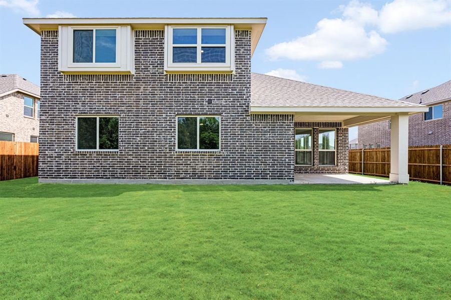 Front exterior of a new home in Sable Creek, Sanger, TX, highlighting curb appeal (Image 1). Front exterior of a new home in Sable Creek, Sanger, TX, highlighting curb appeal (Image 1).