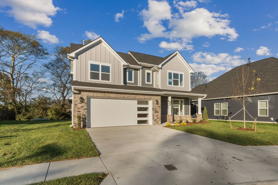 Front exterior of a new home in Nexus – Village Collection, Gallatin, TN, highlighting curb appeal (Image 2).